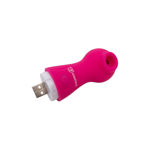 Succionador clitoriano Nyla de color fucsia, mostrando su base blanca y conector USB para carga. | Sexpecialista Shop